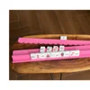 poussoir en bois rose