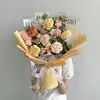 cream yellow large bouquet, handbag + light