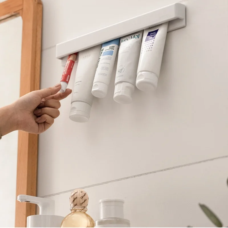 Cross-border Bestseller ABS Wall-mounted No-drill Non-slip Squeeze-assist Facial Cleanser & Toothpaste Holder Long-style Storage