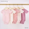 Set da cinque pezzi con fiocco rosa