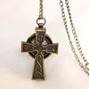 Collier croix creuse en bronze antique