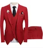 Top rosso, pantaloni, gilet
