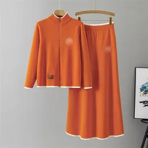 GX15005 Fashion 2026 Fall Winter Women Clothing Vendor Street Wear Elegant Long Sleeve Jacket and Maxi Knitted Skirt 2 Piece Set