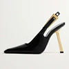 Black gold heels