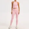 Gilet + pantalon rose pêche