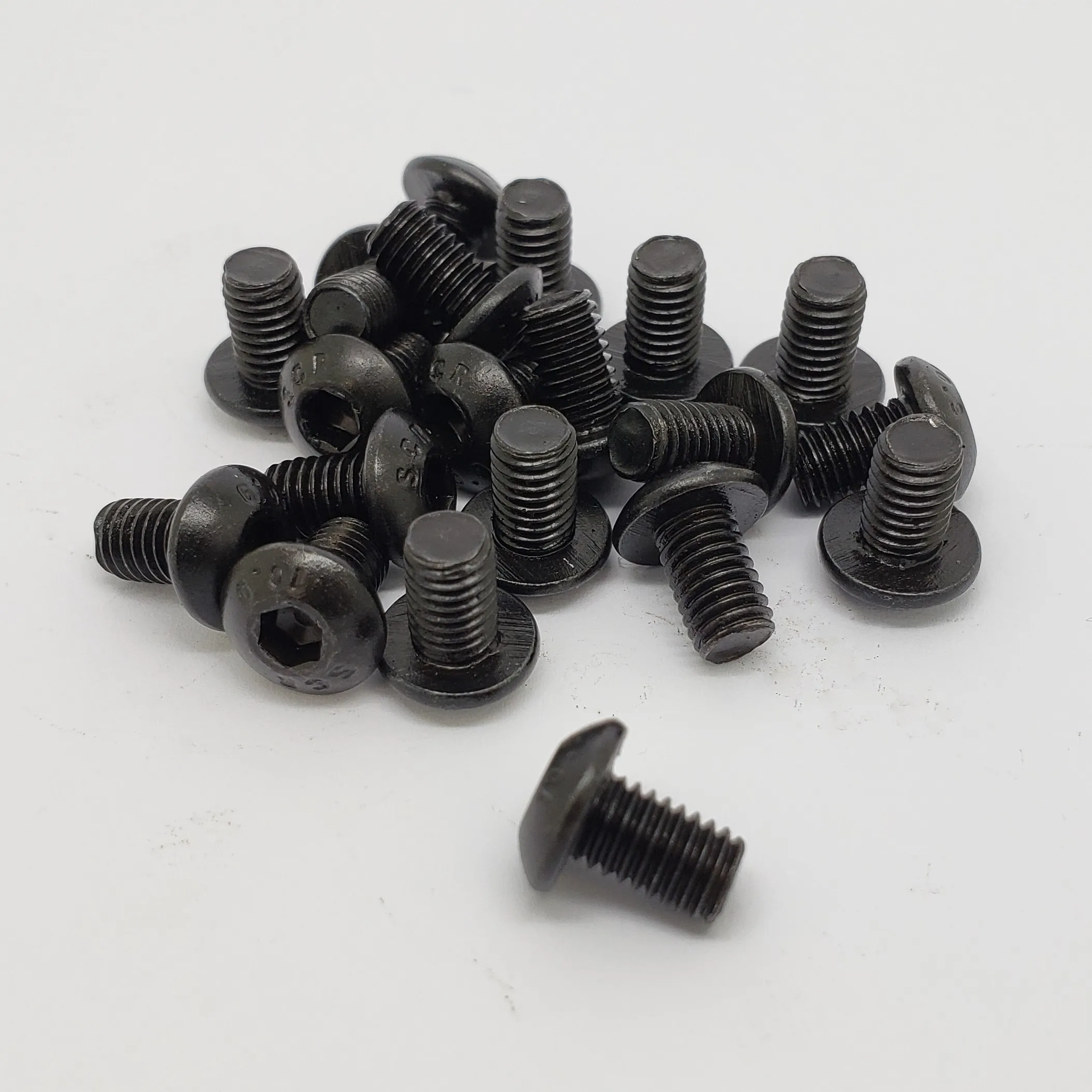 latest company news about NXF ISO7380 Standard Carbon Steel AISI 1074 M1-M12 Round Head Black Hex Screws Button Head Threaded Socket Bolts  4