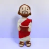 Figura ALB roja con libro