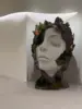 Single-eyed human face
