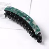 3 green hair clips