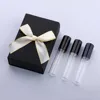 Bouteille transparente avec pulvérisateur noir + boîte cadeau
