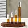 Botellas de ámbar con pulverizador plateado