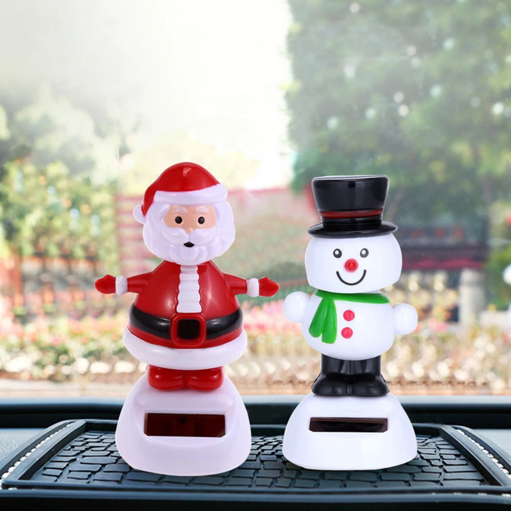 Рождественский танцующий снеговик на солнечной батарее