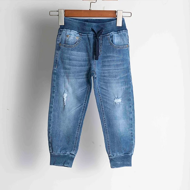 Wholesale Broken Holes Design Stretch Drawstring Middle Waist Pockets Rib Leg Opening Kids Boys Jeans