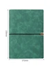 Libro con correa retro verde oscuro.
