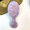Dientes de peine de cerdas de cerdo de color púrpura rosado