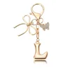 Porte-clés petit papillon doré-L