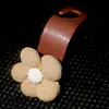 Orange flower [brown hook]