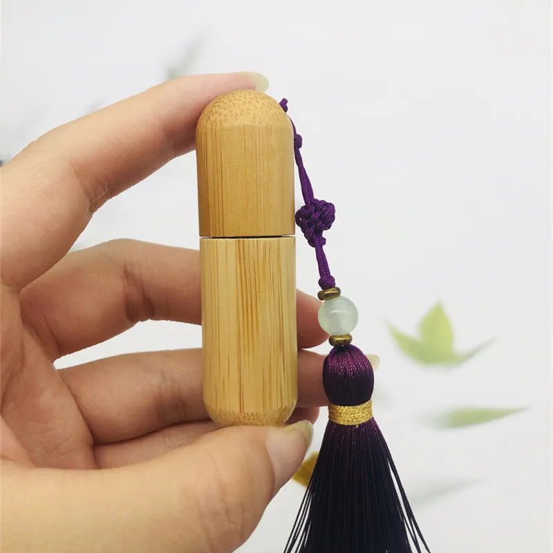 New Style 1ml 2ml 3ml 5ml Cute Refillable Bamboo Roller Bottle Essential Oil with Steel Roller Ball and Tassels