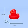 Pato rojo de tapa abierta