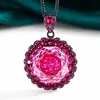 Pendentif or noir rose rouge avec chaîne Chopin