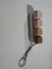 Tira de cuatro teclas con fondo blanco.