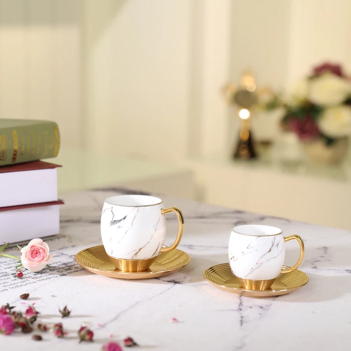 Taza De Café De Porcelana Blanca De Alta Calidad Con Mango Dorado Y  Platillo De Aluminio,Color Ámbar,Estilo Lujoso - Buy Taza De Café Con Mango  De Metal Blanco Porcelana Tazas Taza De