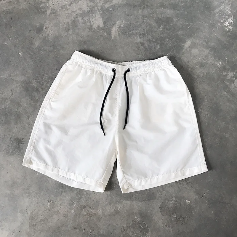 Benutzerdefinierte Unisex-Sommer-Laufsport-Shorts in Übergröße, Sublimations-Polyester-Blank-Shorts für Fitnessstudio, Basketball-Mesh-Herren-Shorts591_voghion.com