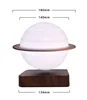 Dark wood base levitating saturn