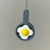 Volteador de huevos para sartén
