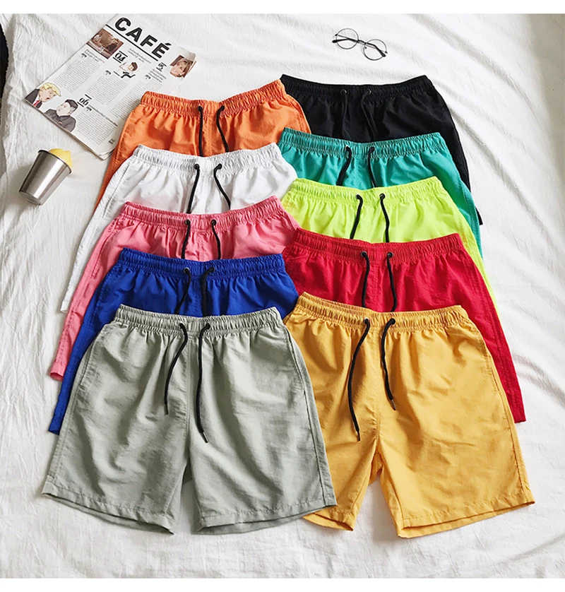 Pantaloncini da surf all'ingrosso Pantaloncini casual da spiaggia da uomo personalizzati Capispalla di moda Costume da surf allentato impermeabile484_voghion.com