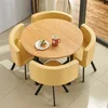 Beige leather dining table and chairs set