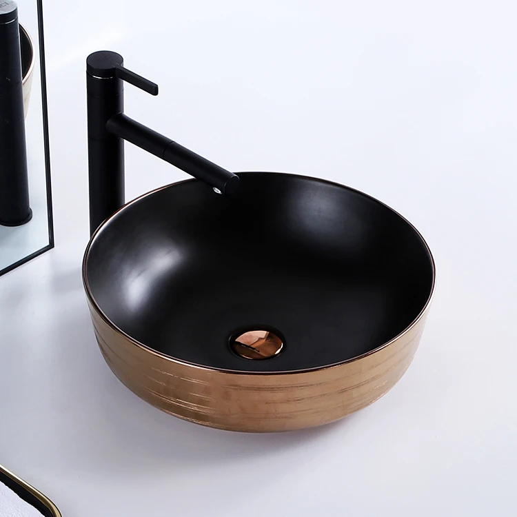 Modern novel design round small plating rose gold black color luxury countertop ceramic sink art washbasin hand wash basin