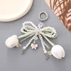 K4866 pendentif noeud stéréo tulipe blanc
