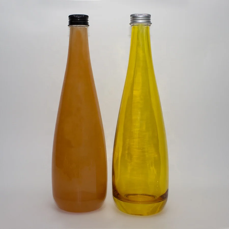 Nice 200ml 375ml 500ml 750ml Transparent Round Empty Flint Glass Liquor Wine Vodka Tequila Bottle with sealed Cork Lid
