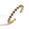 Bracciale quadrifoglio in oro nero con diamanti