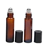 Amber bottle body + black plastic cap + transparent steel beads