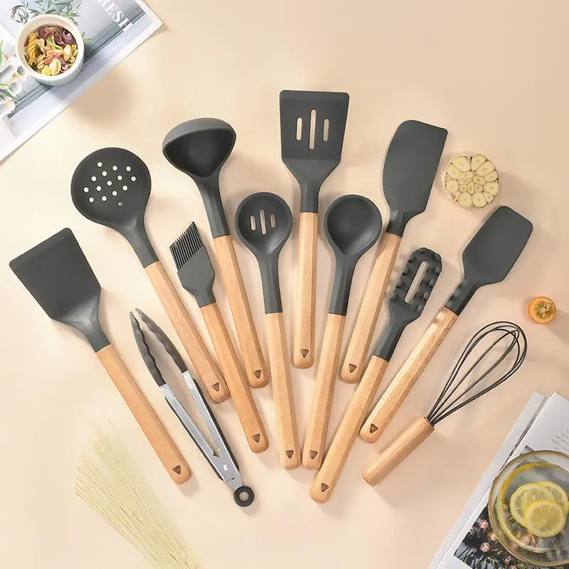 Reusable Adaptive Silicone Kitchen Utensil Set Cooking Skimmer Stainless  Steel Wood Tools - China Utensil Set and Kitchen Spoon price