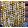 Perles de coquillages jaunes naturels 7A