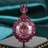 Pendentif rose séchée en or noir avec chaîne Chopin