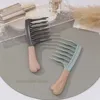 Peigne à cheveux ondulés [gris]]