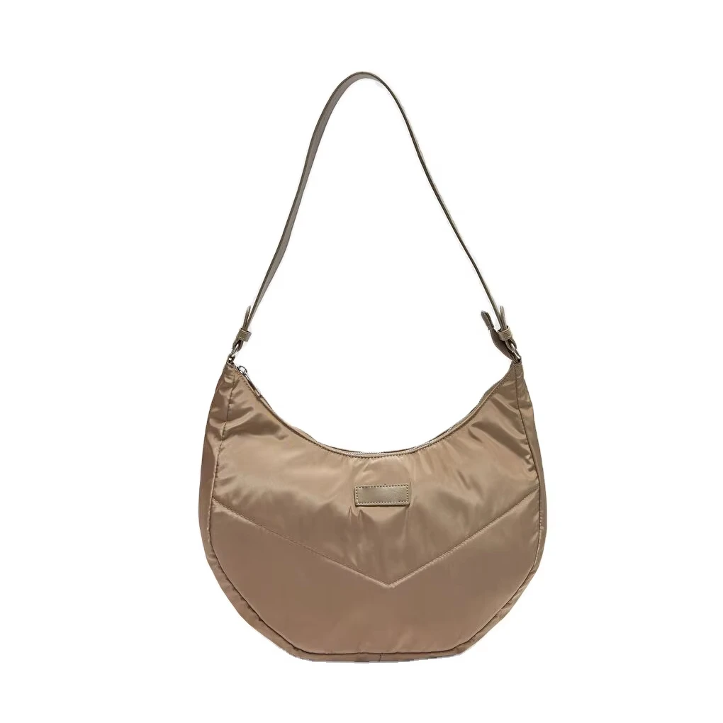 حقائب نسائية عصرية جديدة للسيدات، حقائب يد صغيرة من النايلون على شكل رغيف مُدوّر للشابات، مزودة بسحّاب وإطلالة بتصميم حلوى، وبطانة من البوليستر