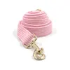Correa para perro de pana rosa.