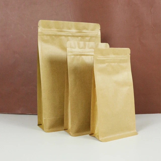 OEM Design Gravure Printed Matte Coffee Kraft Flat Bottom Paper Bag with One Way Valve for Pet Food and Potato Chips