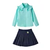 Camicia di pizzo verde femminile + gonna a pieghe blu Navy