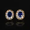 Gold blue pointed crystal stud earrings