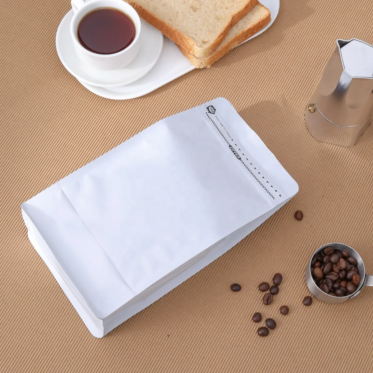 High Quality Customized Matt Finish Coffee Bag Zip Flat Bottom 250G 500G 1000G Black and White Pull Tap Kraft Paper Material supplier