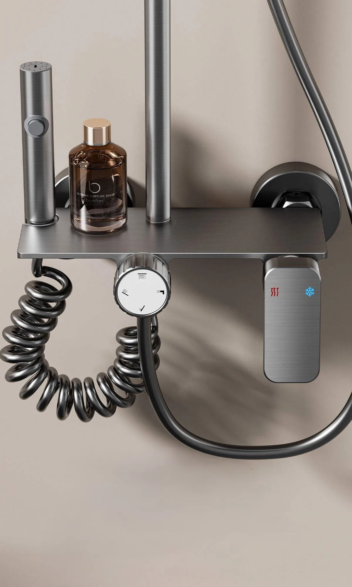 Close-up view of brushed aluminum mixer valve and shower controls