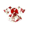 Blanco con estampado de rosas rojas
