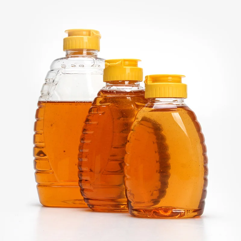 Factory Direct Sales Pet Plastic Honey Jar With Silicone Lid Squeeze