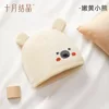 The bear is light yellow.